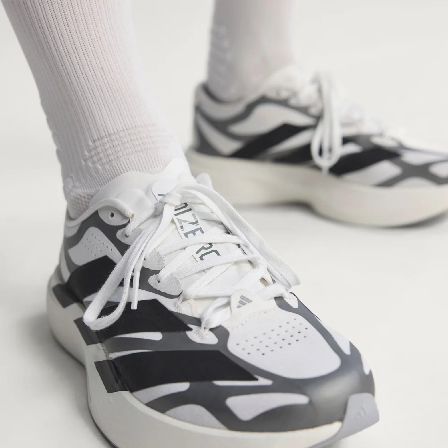 Men's Adizero EVO SL EXO Running Shoes Cloud White / Core Black / Iron Metallic - Image 3