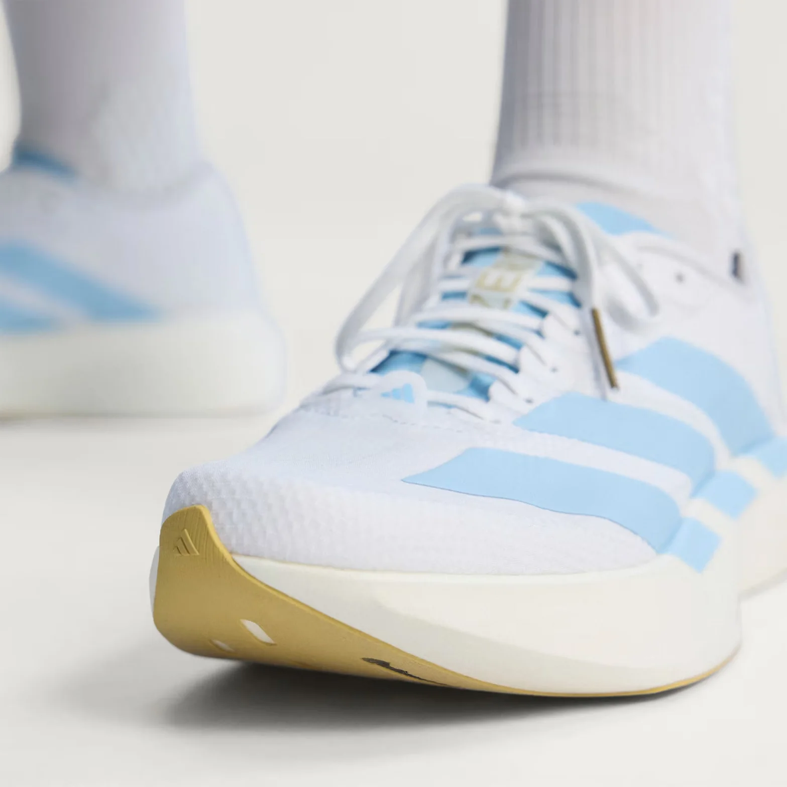 Women's Adizero EVO SL Woven Running Shoes Cloud White / Clear Blue / Matte Gold - Image 4