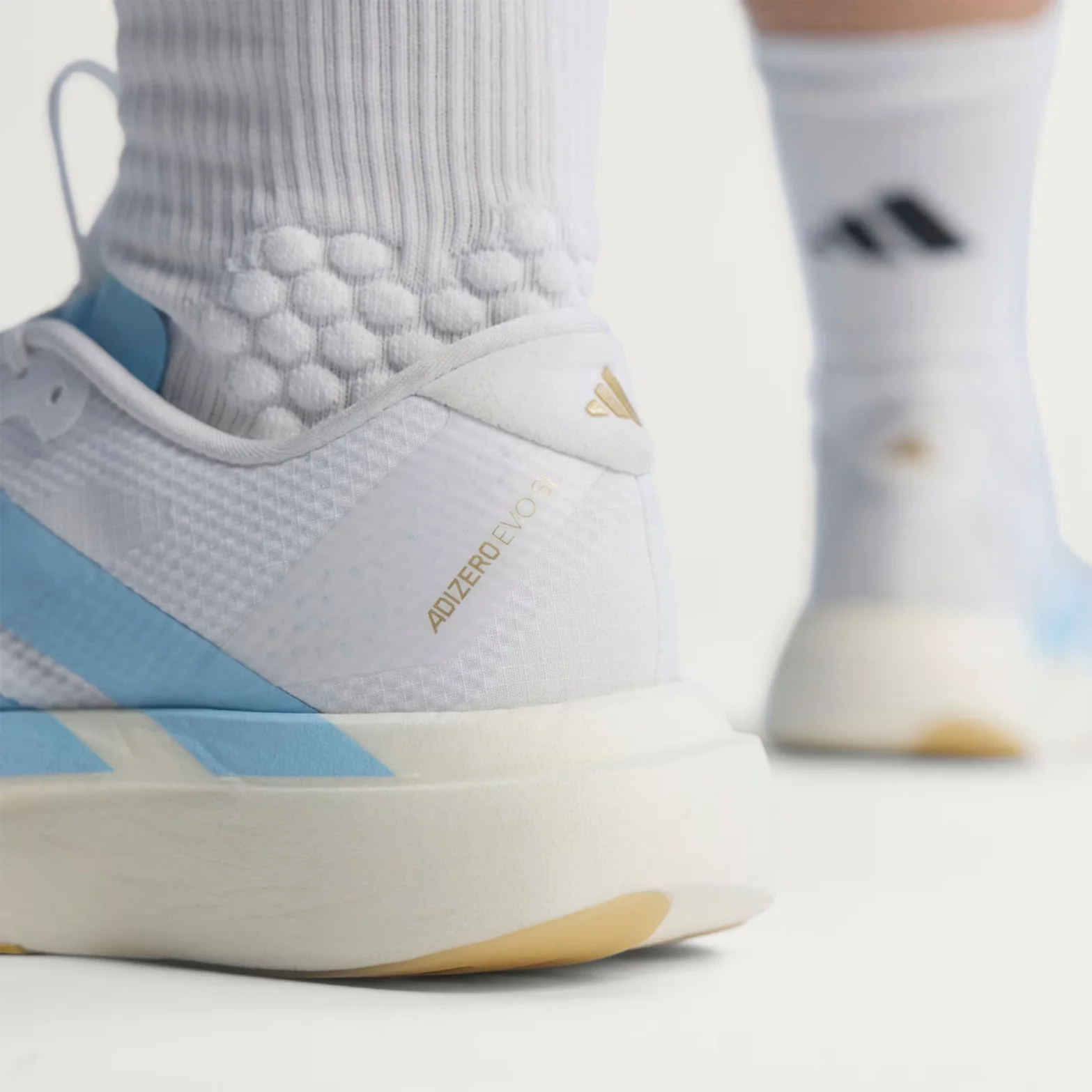 Women's Adizero EVO SL Woven Running Shoes Cloud White / Clear Blue / Matte Gold - Image 5
